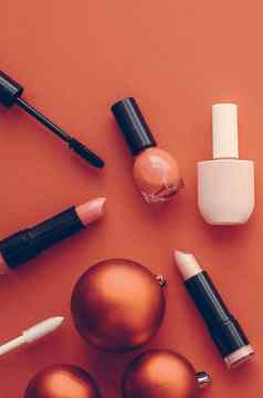 化妆化妆品产品集美品牌圣诞节出售促销活动古董橙色平铺背景假期设计