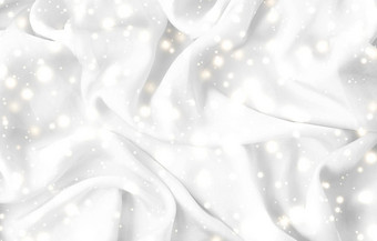 魔法假期白色软丝绸平铺背景纹理发光的雪奢侈品美摘要背景