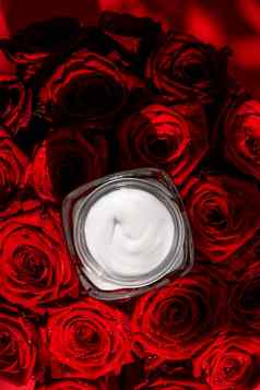 保湿美脸奶油敏感的皮肤红色的玫瑰花奢侈品清洁护肤品化妆品花背景