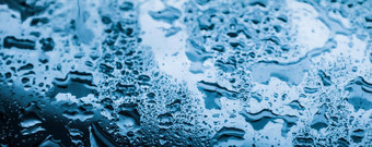 <strong>水纹</strong>理摘要背景阿卡滴蓝色的玻璃科学宏元素多雨的天气自然表面艺术背景环境品牌设计
