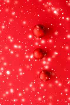 圣诞节装饰物红色的背景雪闪闪发光的奢侈品冬天假期卡