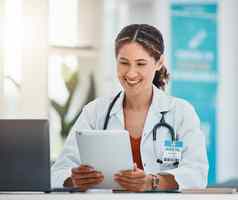 医院医生视频调用平板电脑快乐沟通在线病人加拿大医疗保健女人互联网技术应用程序虚拟咨询谈话办公室