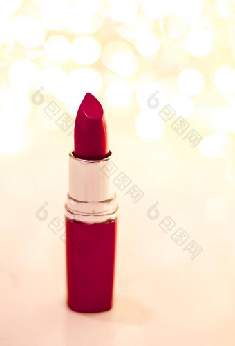 黑暗红色的口红金圣诞节年情人节一天假期闪闪发光的背景化妆化妆品产品奢侈品美品牌