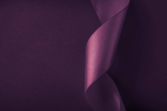 摘要卷曲的丝绸丝带紫色的背景独家奢侈品品牌设计假期出售产品促销活动魅力艺术邀请<strong>卡</strong>背景