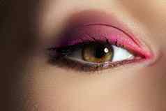 特写镜头宏女人脸粉红色的眼睛化妆时尚庆祝化妆美丽的明亮的品红色的红色的化妆