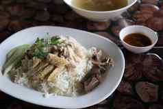 泰国食物美食蒸鸡大米木背景