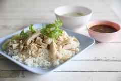 泰国食物美食蒸鸡大米木背景