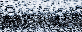 <strong>水纹</strong>理摘要背景阿卡滴银玻璃科学宏元素多雨的天气自然表面艺术背景环境品牌设计