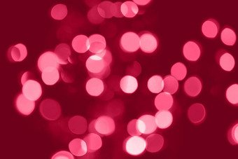 还活着品红色的灯散景背景圣诞节灯散景还活着品红色的摘要背景模糊发光的灯还活着品红色的散景镜头效果照明点