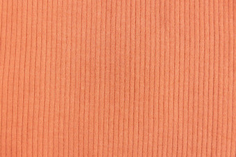 肋<strong>棉花</strong>织物纹理柔和的橙色颜色关闭肋骨<strong>棉花</strong>布纺织品模式自然有机面料纹理背景