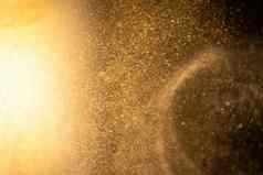 黄金灰尘粒子摘要散景明星粒子黑色的背景未来主义的点空间