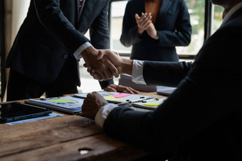 业务伙伴关系会议概念图像商人握手成功的商人握手好交易集团支持概念