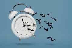 时间运行白色报警时钟飞行数字象征失去了时间概念时间运行损失缺乏时间报警时钟数字打破了小块