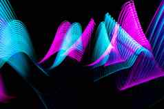现代光绘画波设计技术霓虹灯蓝色的粉红色的行黑色的背景