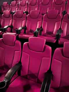 电影娱乐空粉红色的电影剧院座位显示流媒体服务电影行业生产