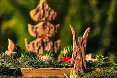 圣诞节木碗天使冷杉树树枝木蜡烛