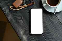 前视图聪明的电话白色空屏幕杯咖啡乡村木表格