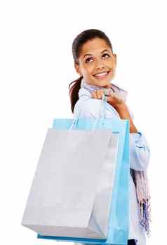 女人购物袋微笑时尚出售折扣交易白色工作室背景快乐孤立的女购物者微笑持有礼物袋零售购物疯狂白色背景