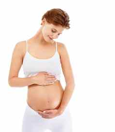 怀孕爱女人持有胃工作室产前护理母亲幸福孕妇健康快乐怀孕了女模型拥抱肚子白色背景