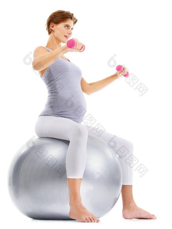 健身举<strong>重</strong>怀孕了女人健身房球孕妇健康健康的生活方式幸福体育怀孕女<strong>锻炼锻炼</strong>普拉提哑铃工作室