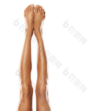 腿脚女人护肤品模型拔毛美修脚白色背景水疗中心治疗健康化妆品护理发光健康的皮肤自然化妆品发光