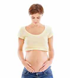 怀孕了女人白色背景触摸胃身体孕妇健康希望医疗保健腹部美怀孕妈妈。工作室背景护肤品健康的皮肤病学