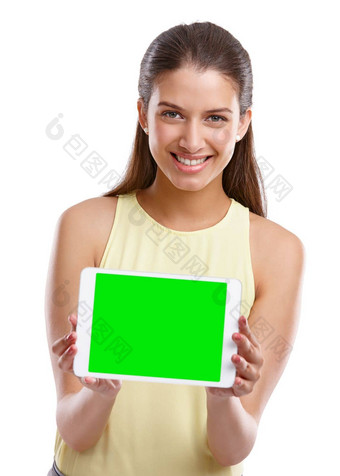 <strong>主页</strong>工作室拍摄美丽的年轻的女人持有数字平板电脑浓度关键屏幕白色背景
