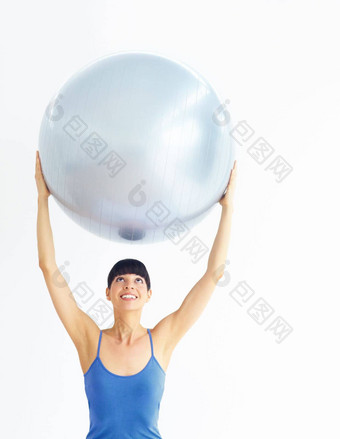 持有伟大的健康理想健康的年轻的女人锻炼持有锻炼<strong>球</strong>