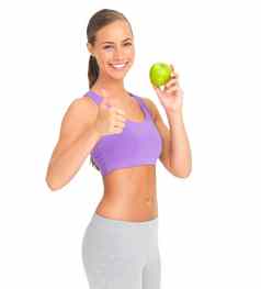 女人工作室肖像苹果拇指健康饮食目标健康白色背景孤立的模型健康的水果微笑营养维生素自然排毒强大的身体