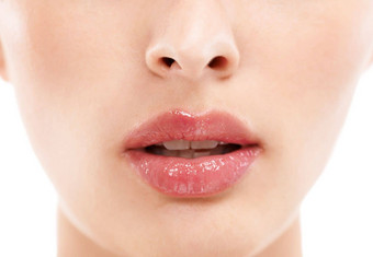 女人脸护肤品嘴唇化妆化妆品口皮肤病学医疗保健健康白色背景变焦美模型宏面部唇光泽产品胶原蛋白水合作用发光
