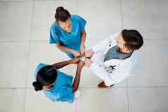 医疗医生护士拳头撞手显示支持健康社区视图护理医疗保健医疗团队显示成功团队建筑医院