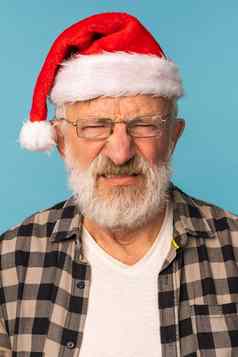 工作室肖像白色胡子男人。圣诞老人他相机伤心愤怒的表达式情感坏圣诞节情绪概念