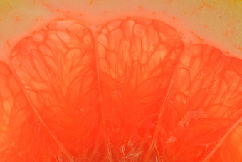 葡萄柚特写镜头片血红色的成熟的葡萄柚纹理红色的多汁的葡萄柚宏图像