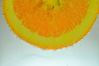 片<strong>橙色</strong>闪闪发光的水<strong>橙色</strong>水果片覆盖泡沫碳酸水<strong>橙色</strong>片水泡沫