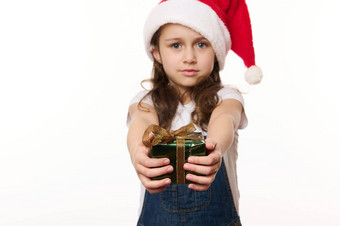 可爱的婴儿女孩孩子圣诞老人他牛仔布工作服将快乐圣诞节现在相机