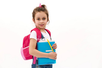 可爱的孩子女孩主学校学生度<strong>字帖</strong>粉红色的背包孤立的白色背景