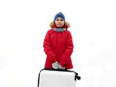 中东十几岁的男孩红色的派克大衣蓝色的他手提箱孤立的白色背景免费的空间