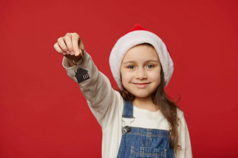 焦点钥匙链手令人愉快的婴儿女孩圣诞老人他持有键房子住宅真正的房地产