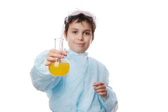 焦点<strong>实验室</strong>玻璃瓶黄色的化学解决方案手<strong>模糊</strong>聪明的十几岁的小学生化学家