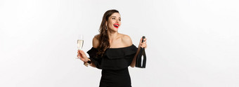 庆祝活动聚会，派对概念时尚的浅黑肤色的女人女人魅力衣服持有瓶玻璃香槟有趣的一年假期