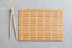 寿司培训棒空竹子席木板石头背景前视图复制stace