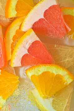 片葡萄柚橙色葡萄柚水白色背景块葡萄柚橙色水果蜂蜜葡萄柚液体泡沫片葡萄柚橙色水果蜂蜜葡萄柚水宏图像水果水垂直图像前视图平设计