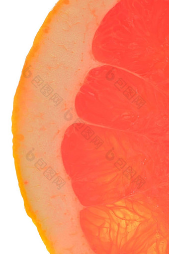 新鲜的有机葡萄柚片白色背景葡萄柚特写镜头片血红色的成熟的葡萄柚纹理红色的多汁的葡萄柚宏细长立式图像