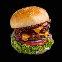 特写镜头美味的新鲜的自制的汉堡生菜奶酪洋葱番茄乡村木董事会黑暗背景