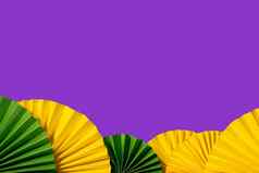 經酱节日传统的颜色背景摘要背景黄色的绿色紫色的纸球迷經酱庆祝活动