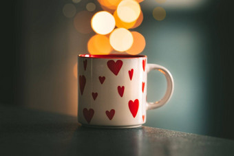 杯茶咖啡心站表格散景背景圣情人节一天爱概念