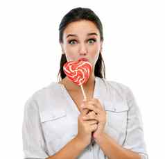 糖果肖像快乐女人棒棒糖工作室糖果渴望甜点糖幸福零食年轻的女模型吃心形状甜蜜的孤立的白色背景