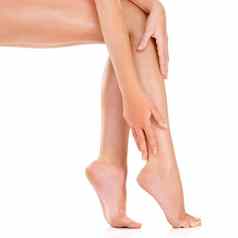 最喜欢的部分身体女人触碰腿白色背景