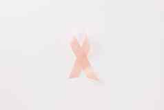 关闭粉红色的意识丝带国际世界癌症一天