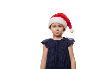高加索人年孩子可爱的女孩优雅的海军衣服圣诞老人他微笑自信相机
